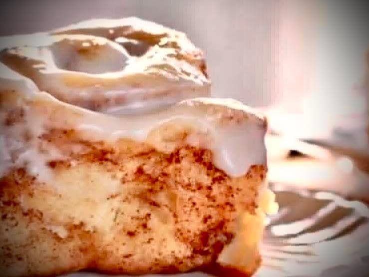 Glazed cinnamon roll fresh from the oven
